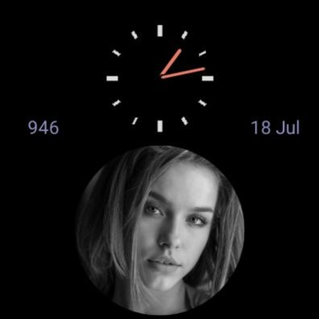Round photo with a small analog clock
